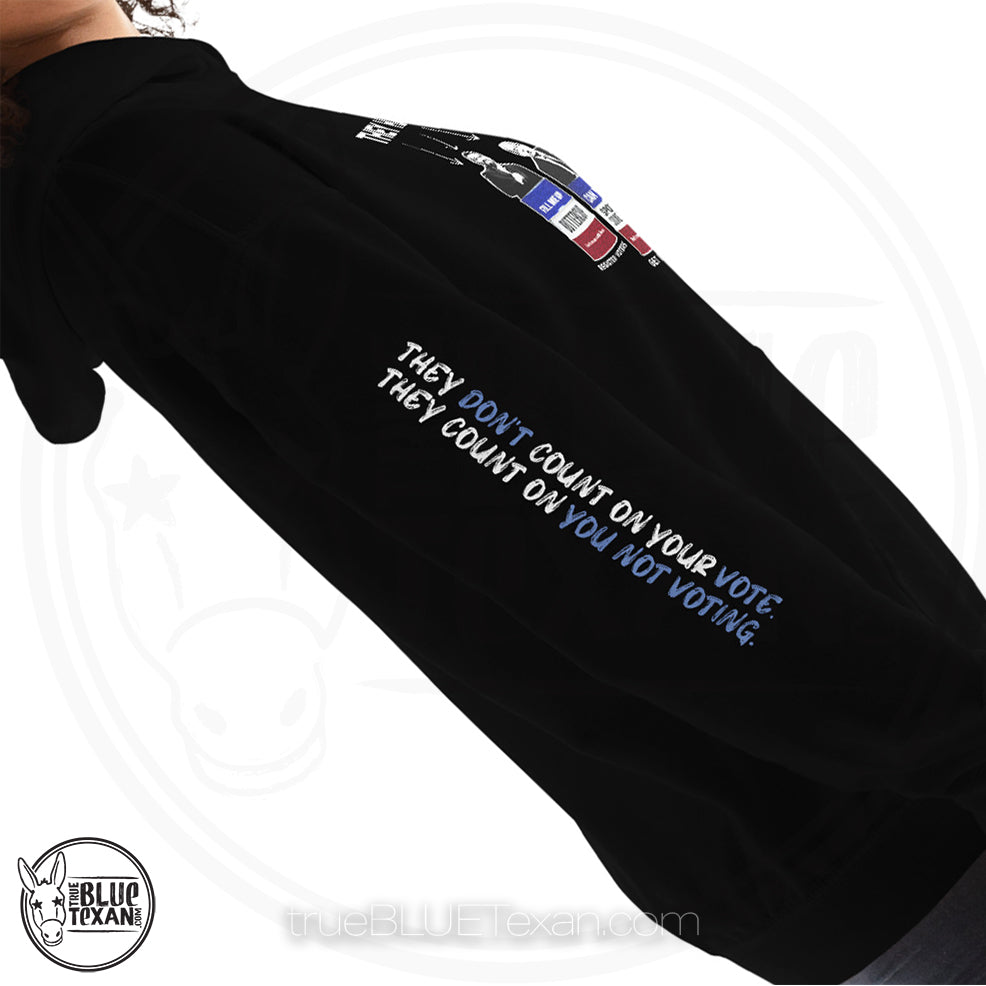 They Have Messed with Texas Trash the Texas GOP Unisex Hoodie featuring Texas GOP Greg Abbott, Dan Patrick, Ken Paxton, Ted Cruz, John Cornyn in Don't Mess with Texas Trash Cans in Black w quote they don't count on your vote, they count on you not voting