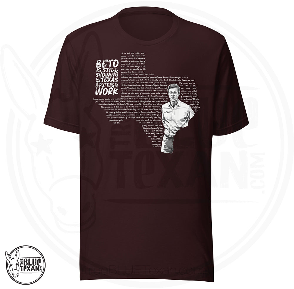 Beto: Man in the Arena Texas Unisex TShirt featuring Beto O'Rourke and the shape of the state of Texas says "Beto is still showing up for Texas & putting in the work in maroon