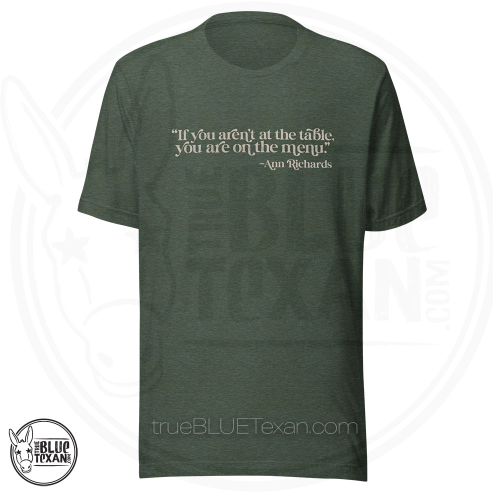 "If you aren't at the table, you are on the menu Ann Richards" quote premium tshirt heather green