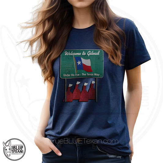 Heather navy premium tshirt tee shirt with 'Welcome to Gilead' graphic design featuring a Texas flag and Handmaid's Tale Women in red dresses