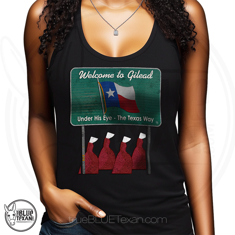 Black tank top with 'Welcome to Gilead' graphic design featuring a Texas flag and Handmaid's Tale Women in red dresses