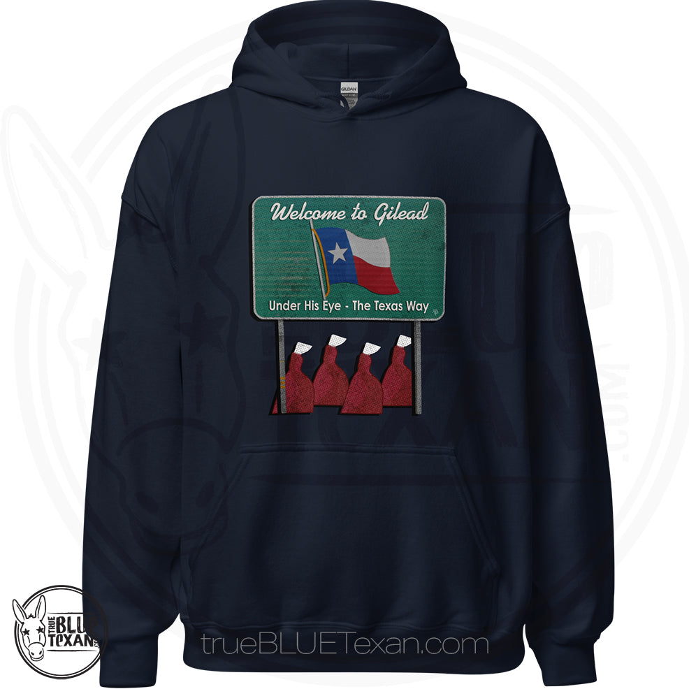 navy premium unisex hoodie with 'Welcome to Gilead' graphic design featuring a Texas flag and Handmaid's Tale Women in red dresses