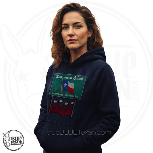 navy premium unisex hoodie with 'Welcome to Gilead' graphic design featuring a Texas flag and Handmaid's Tale Women in red dresses