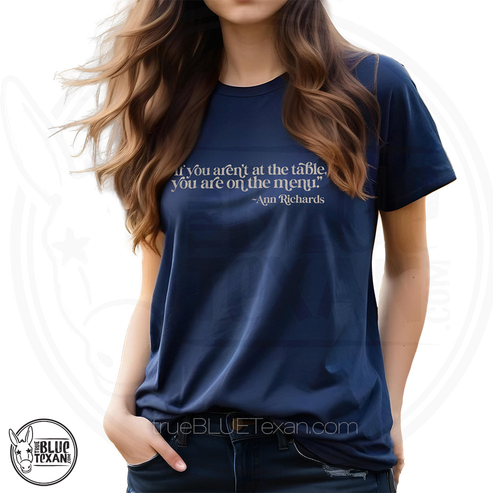 "If you aren't at the table, you are on the menu Ann Richards" quote premium women's tshirt in Navy