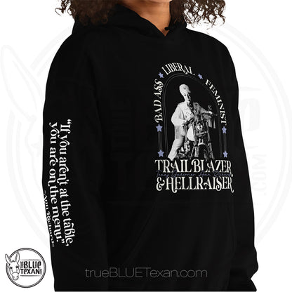 Bad Ass, Liberal, Feminist, Trailblazer, Hellraiser. Texas Governor Ann Richards premium unisex hoodie sweatshirt in black  The arm features the quote "If you aren't at the table. you are on the menu."