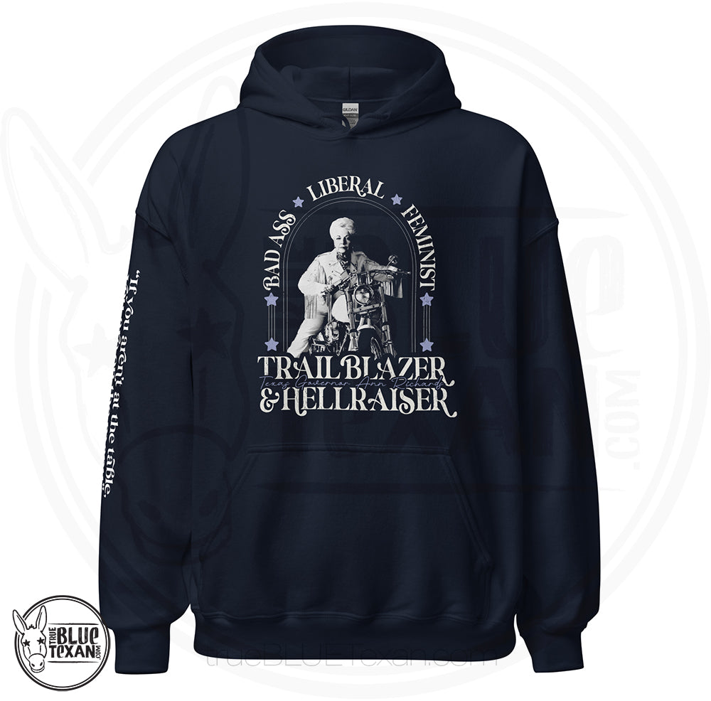 Bad Ass, Liberal, Feminist, Trailblazer, Hellraiser. Texas Governor Ann Richards premium unisex hoodie sweatshirt in navy. The arm features the quote "If you aren't at the table. you are on the menu."