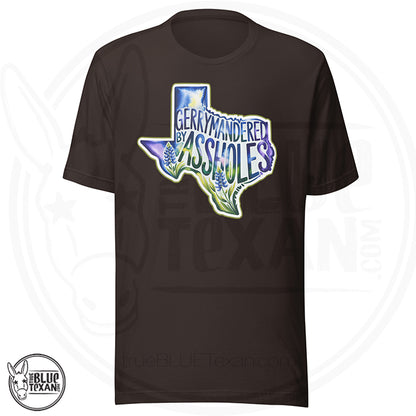 premium unisex tshirt with  the shape of Texas featuring Bluebonnet flowers that says "Gerrymandered by Assholes"  in brown