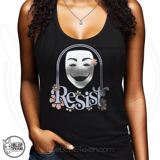 Black tank top with a female guy fawkes mask graphic and 'Resist' with flowers